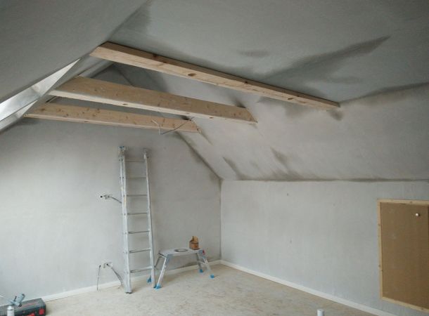 Solid Attics - Conversion - After plaster and beams installed 